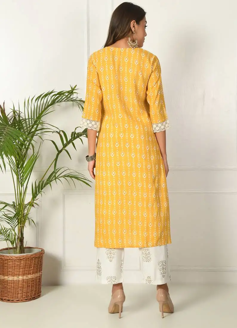 Women yellow rayon printed & trim work kurta bottom set