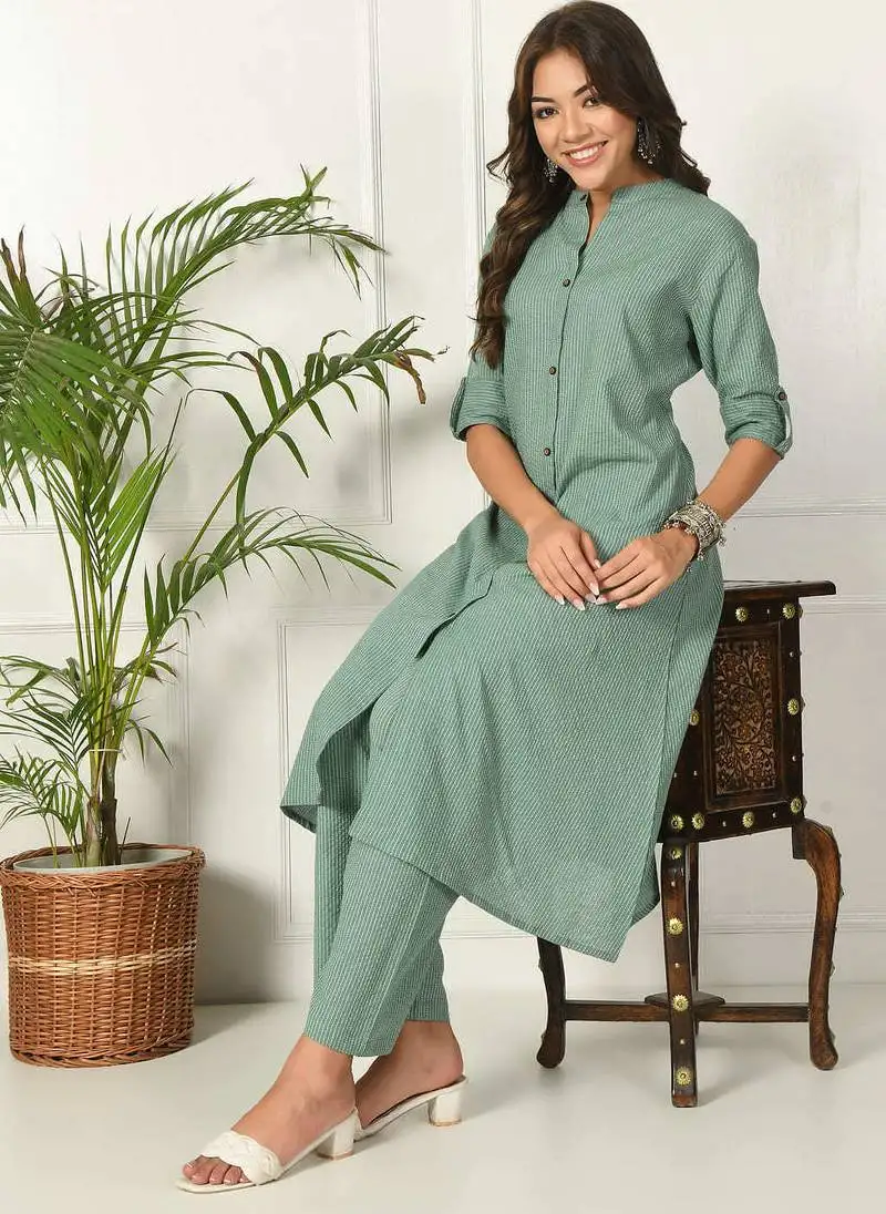 Women green cotton katha & trim work kurta bottom set