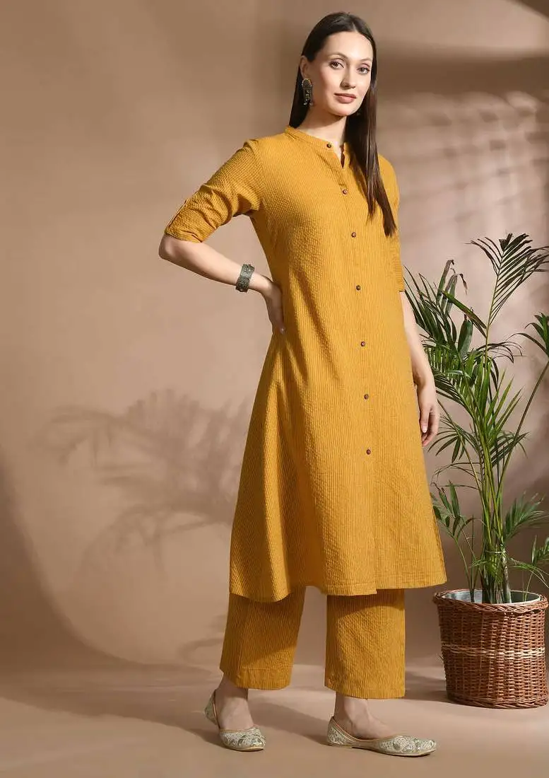Women mustard cotton katha & trim work kurta bottom set