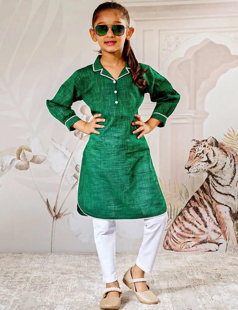 Girl's traditional raksha bandhan outfit - green cotton kurta with white leggings set for casual festival wear