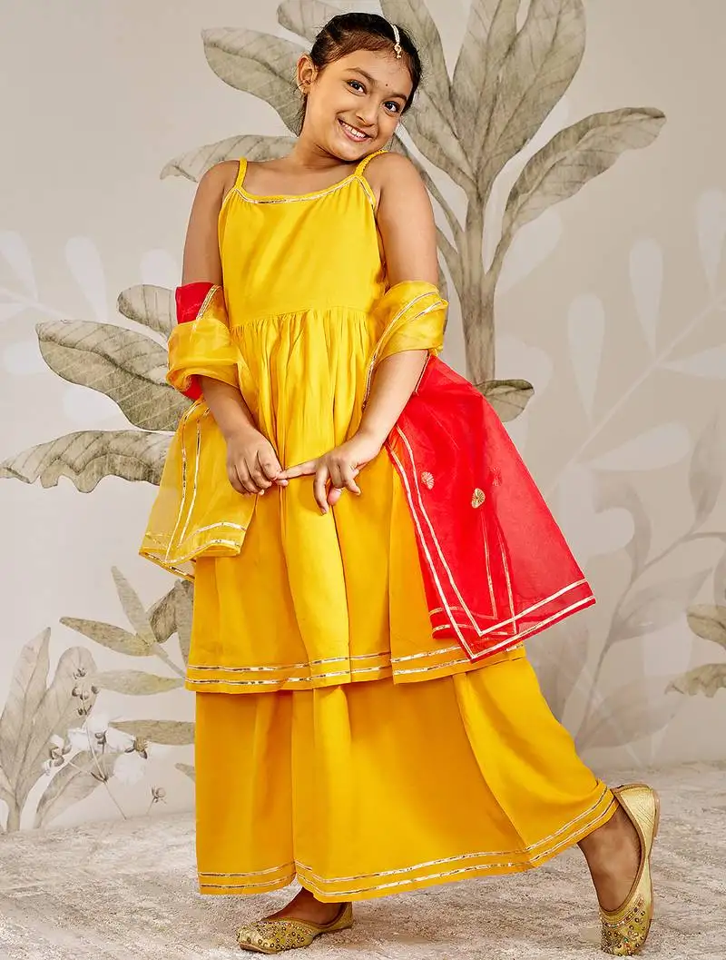 Girl's traditional raksha bandhan outfit - mustard rayon kurta palazzo set with organza dupatta for festival wear
