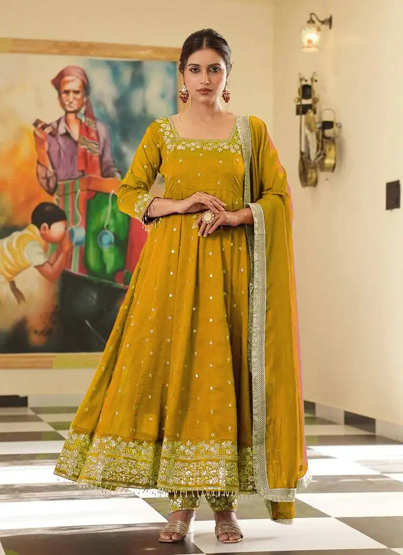 Yellow colour vichitra silk embroidery work fully stitched gown