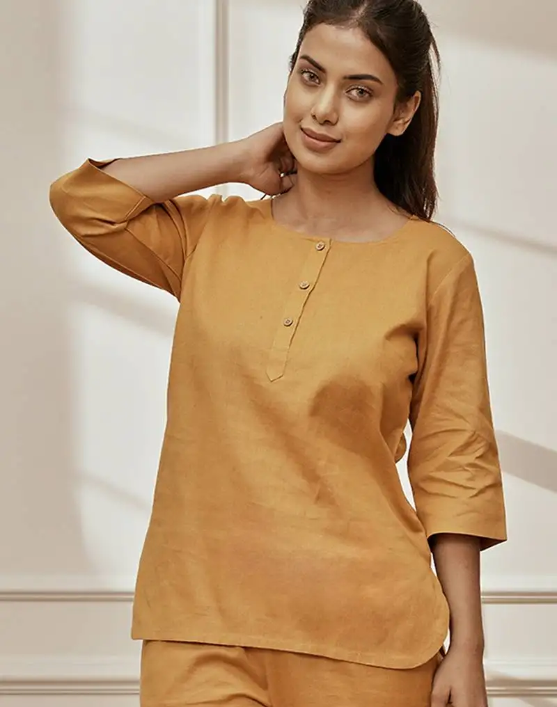 Women's dusty saffron linen cotton yoga kurta with button closure & three quarter sleeves