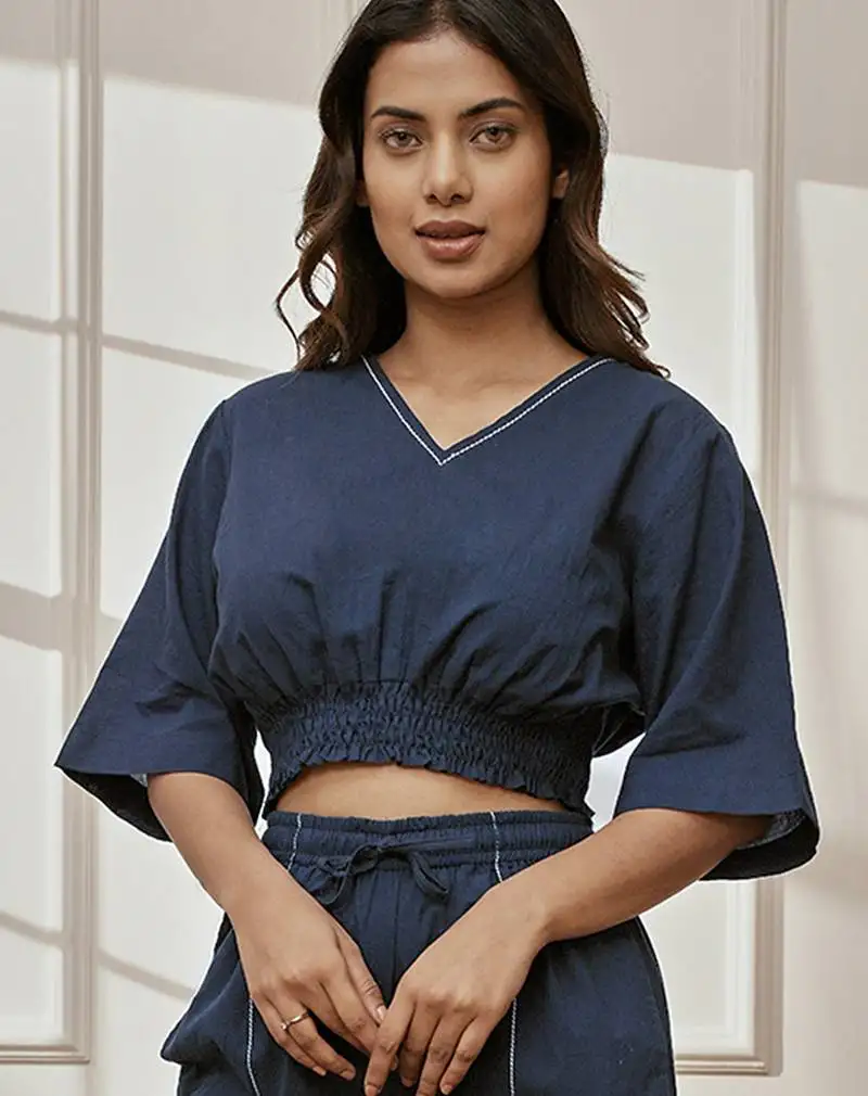 Women's navy blue cotton crop yoga top with geometric embroidery & dolman sleeves