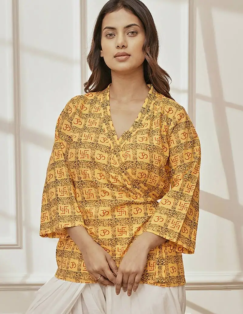 Women's yellow printed cotton wrap around yoga top with ethnic motifs & shawl collar