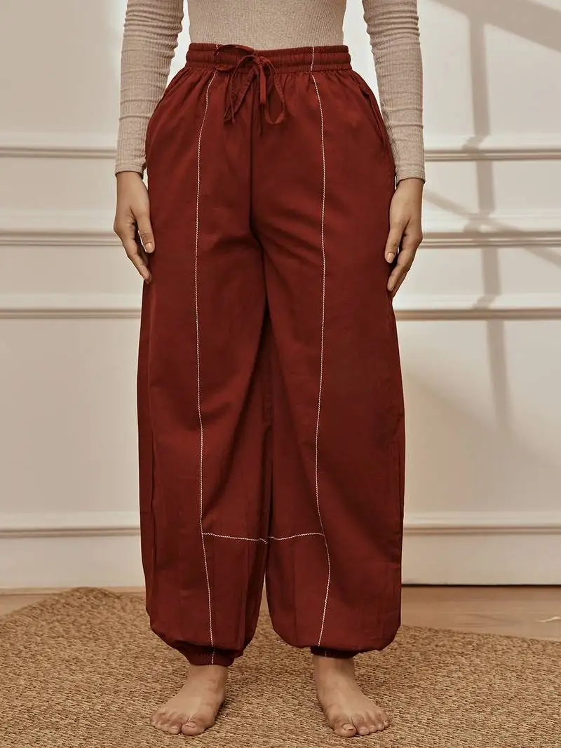 Women's maroon cambric joggers yoga pants with geometric embroidery