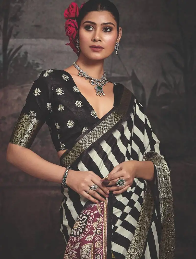 Black dolla silk blend self jaquard border saree with unstitched blouse