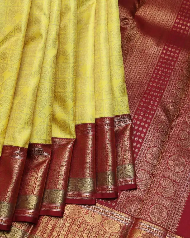 Lemon yellow and maroon pure zari silk saree with silk mark certified
