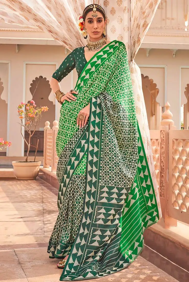 Green silk blend patola print saree with blouse