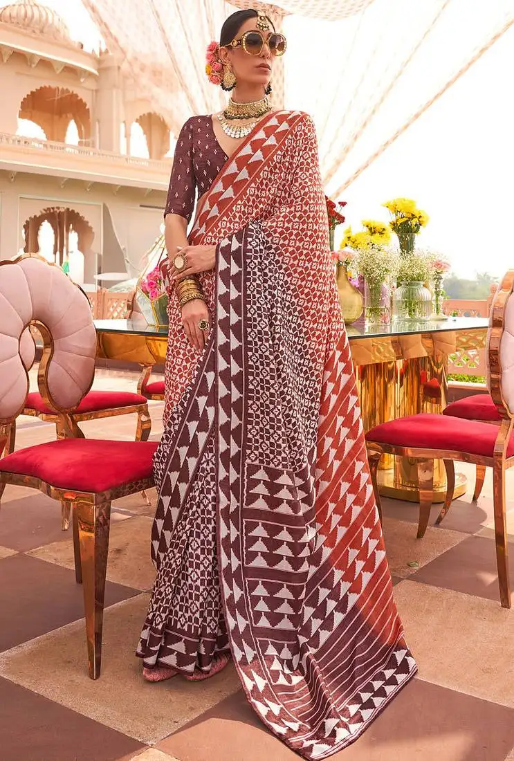 Rust & chocolate silk blend patola print saree with blouse