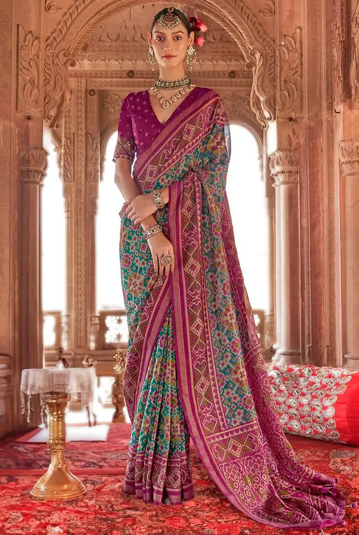 Teal georgette patola print saree with blouse