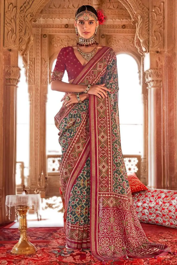 Green georgette patola print saree with blouse