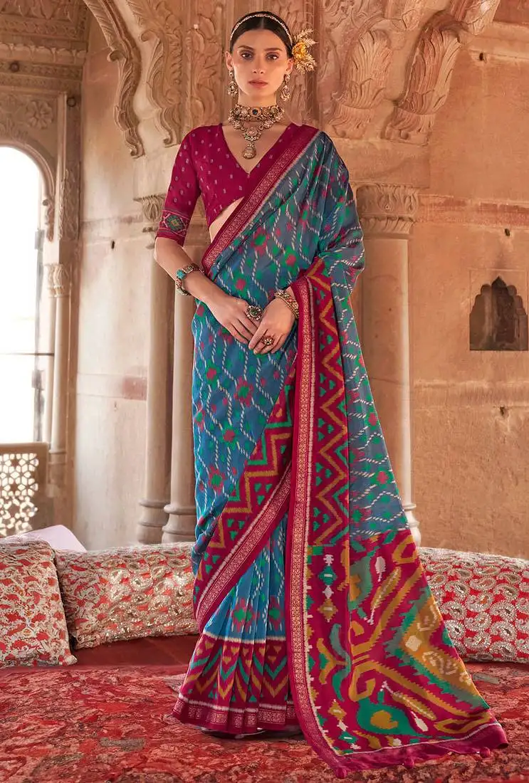 Aqua blue georgette patola print saree with blouse
