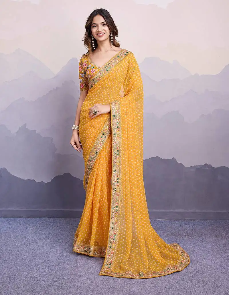 Yellow georgette bandhej saree