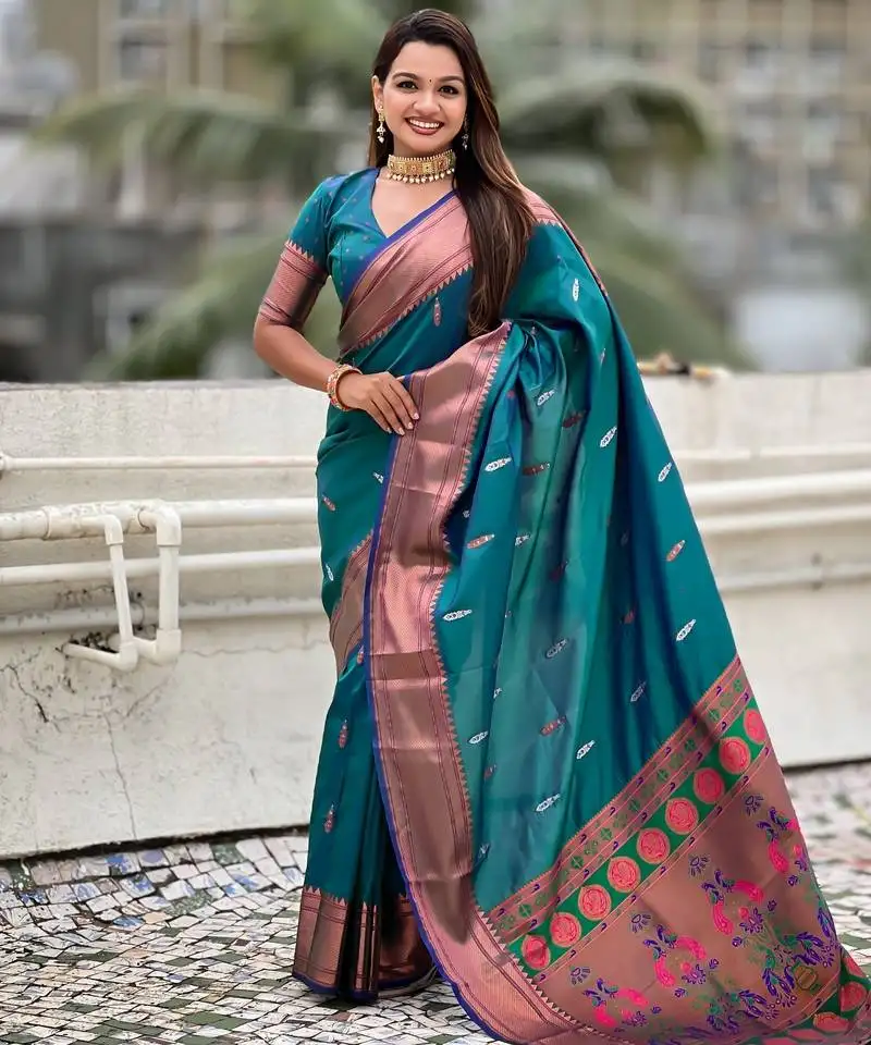 Sea green soft silk blend meenakari woven saree