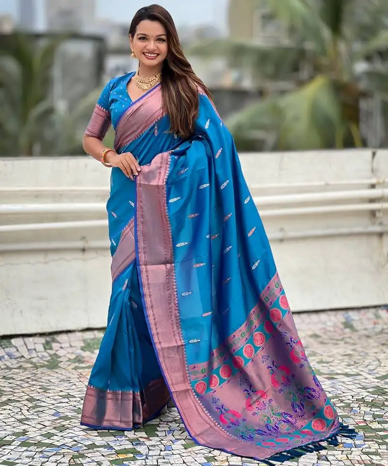 Sky blue soft silk blend meenakari woven saree