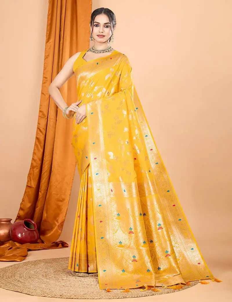 Yellow banarasi silk blend meenakari zari weaving saree with tassels on pallu