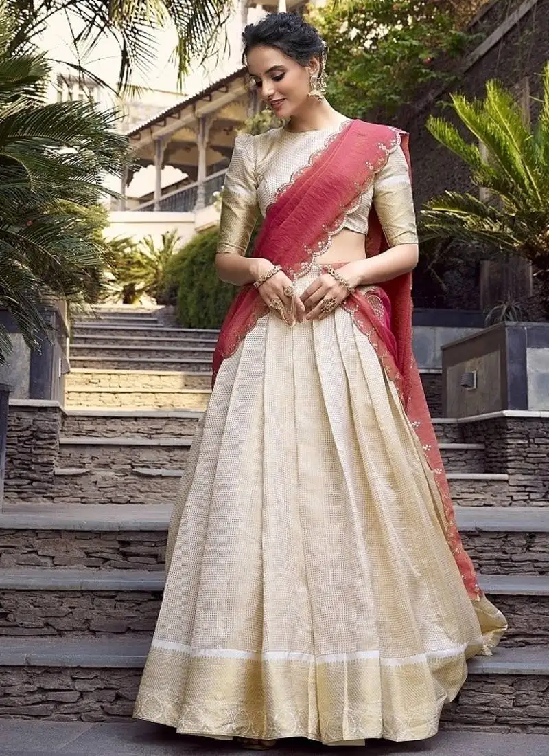 Off-white onam style jacquard zari weaving lehenga choli