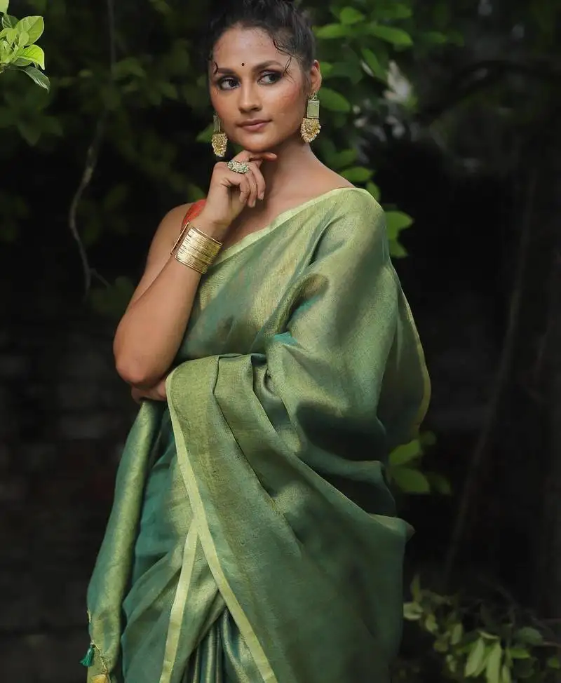 Handwoven green tissue linen saree