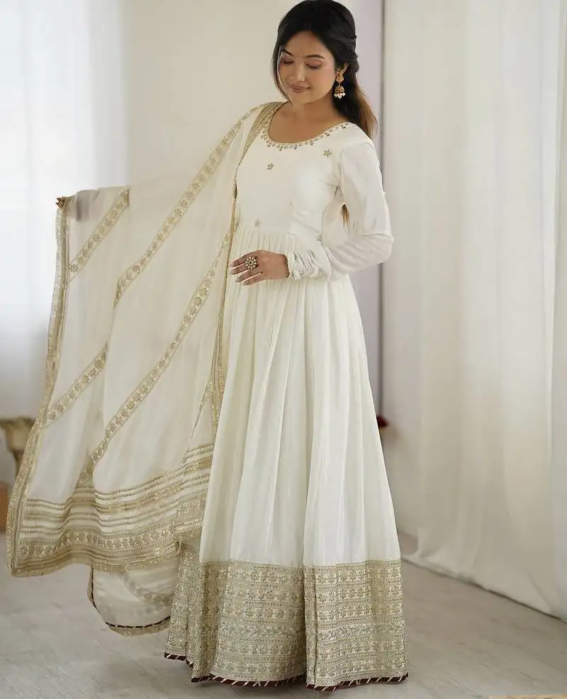 White colour chinnon silk embroidery work long gown stitched