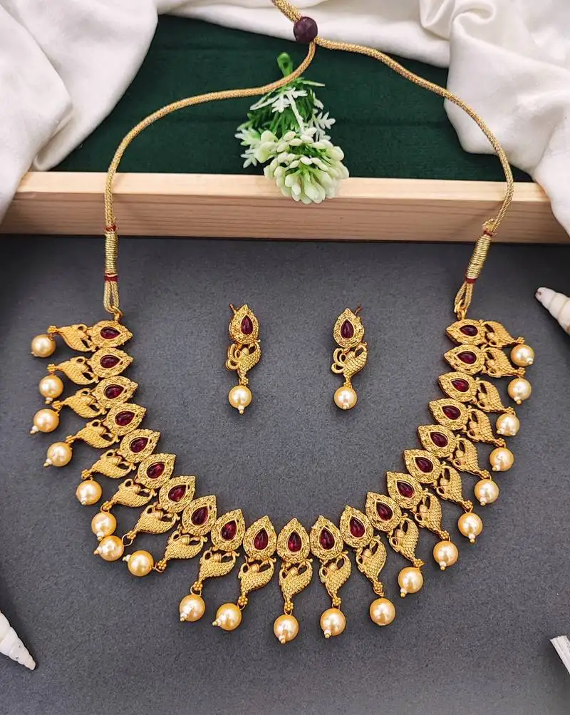 Antique gold peacock necklace set with ruby stones & pearl drops – traditional ethnic jewellery