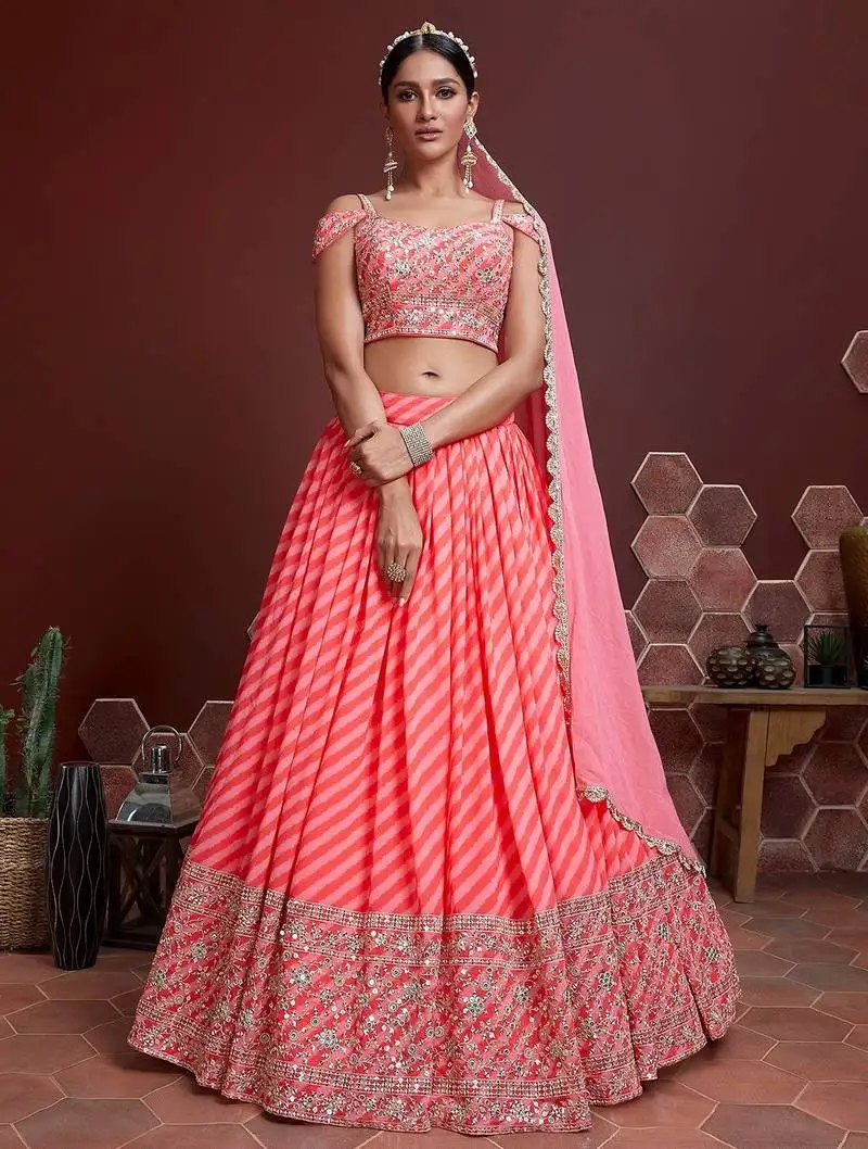Peach zari sequins embroidered organza silk semi stitched lehenga