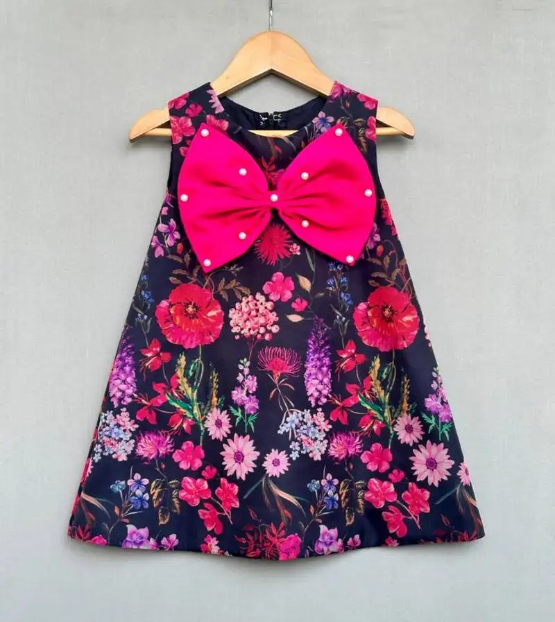 Floral aline dress with hot pink bow
