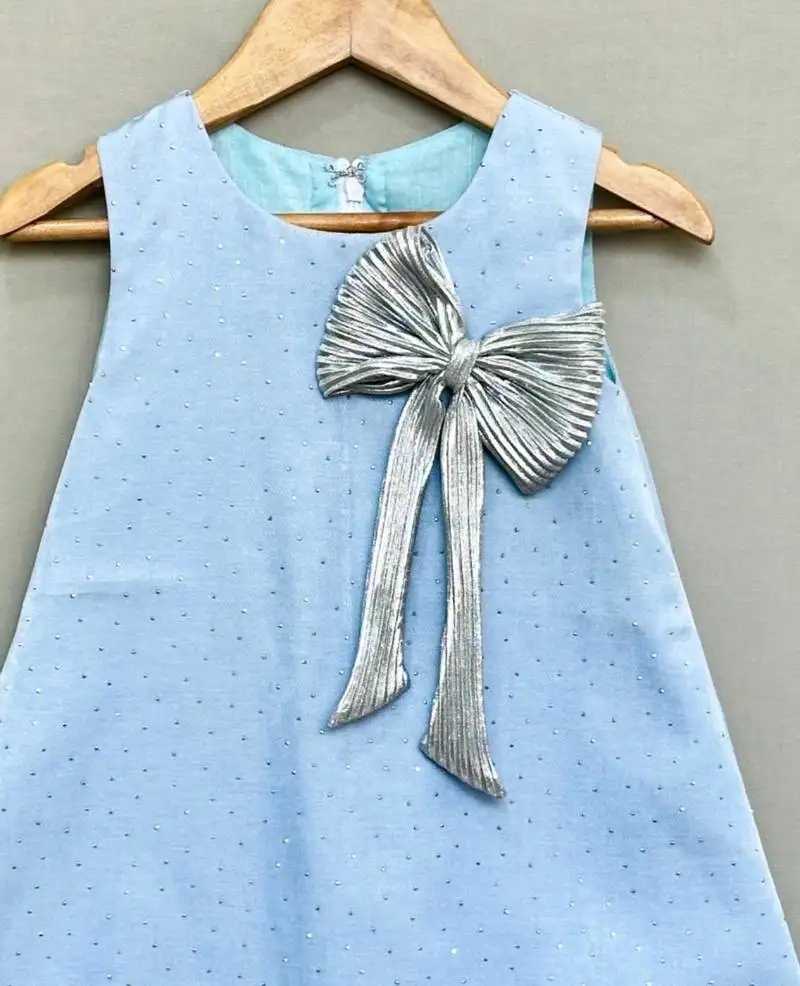 Denim shimmer dress with silver bow