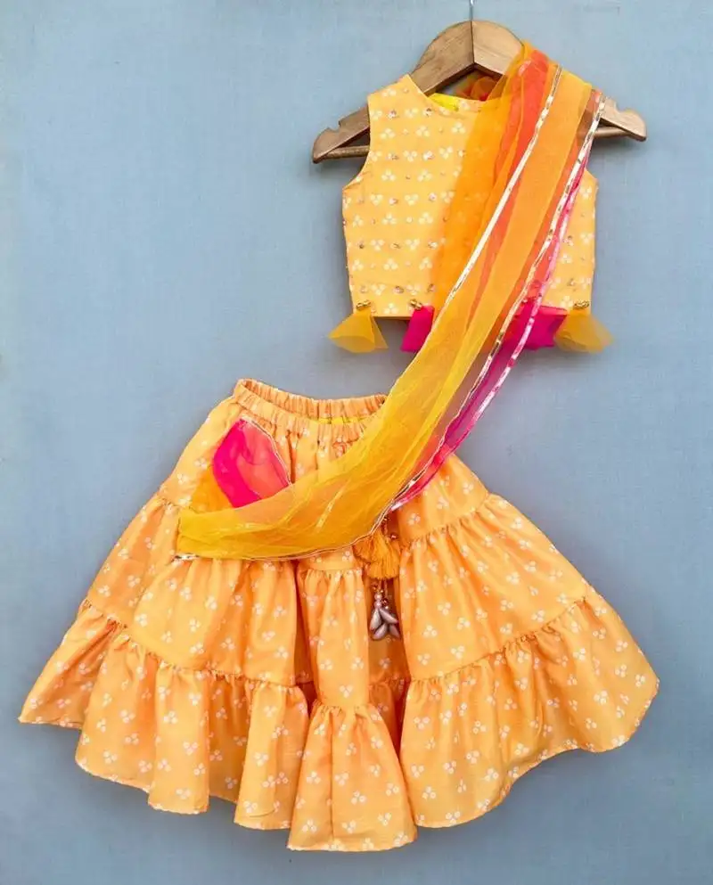 Yellow bandhni lehenga set with attached dupatta