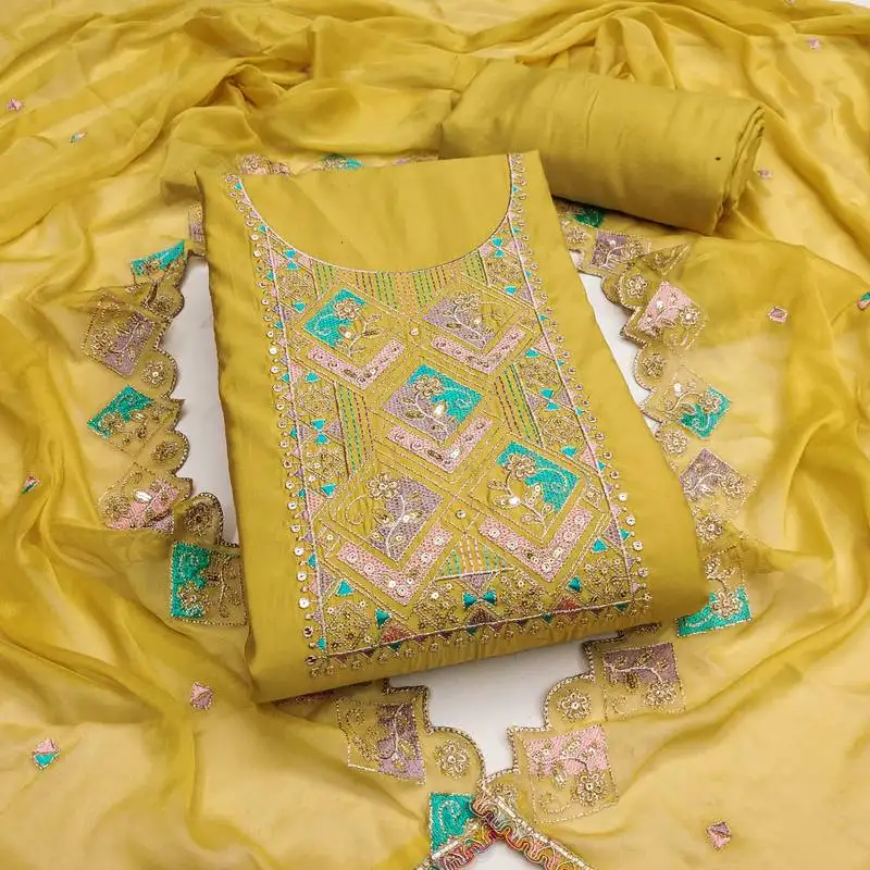 Yellow cotton silk embroidered unstitched dress material