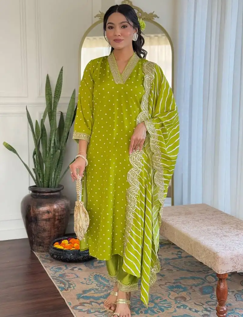 Lime muslin silk print with thread embroidery work kurta pant set