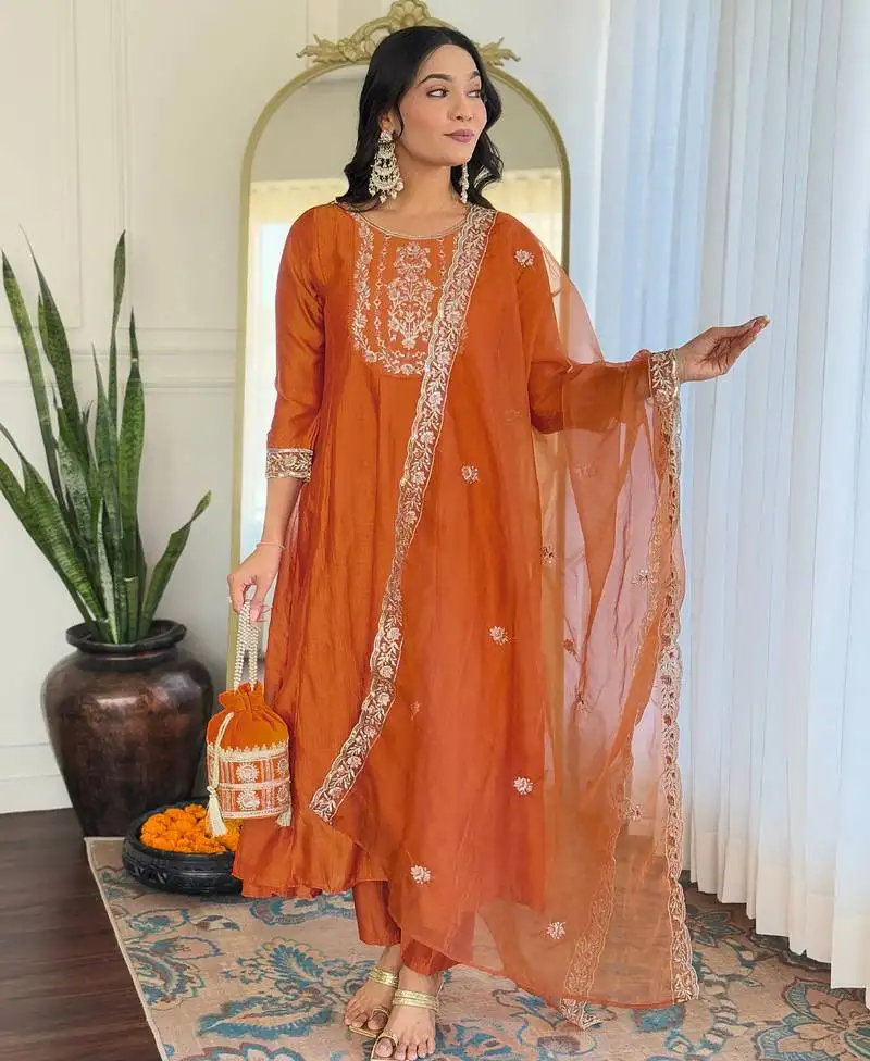 Elegant orange colored party wear embroidered stitched vichitra silk pant style kurti suit with duppatta