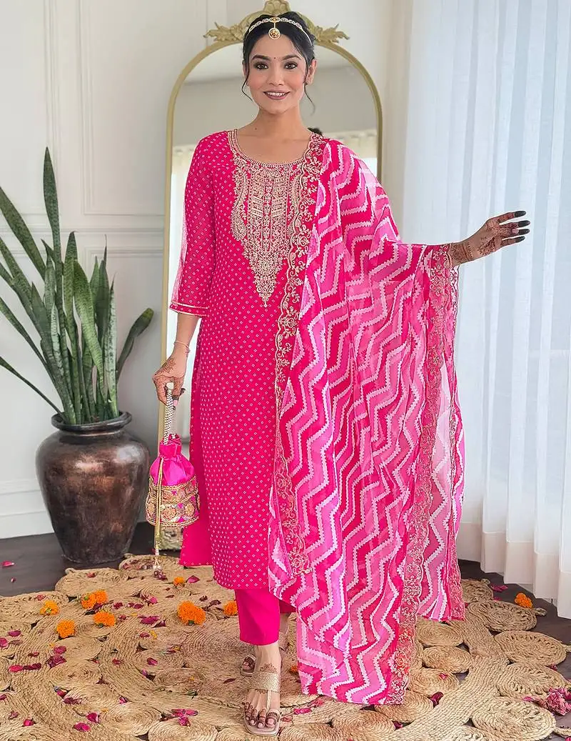 Elegant pink colored party wear embroidered stitched vichitra silk pant style kurti suit with duppatta
