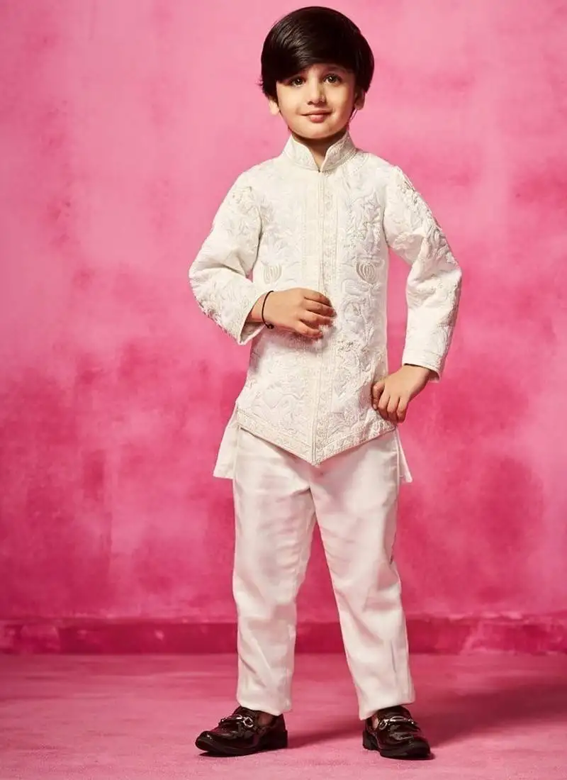 White embroidered satin jacket paired with pant