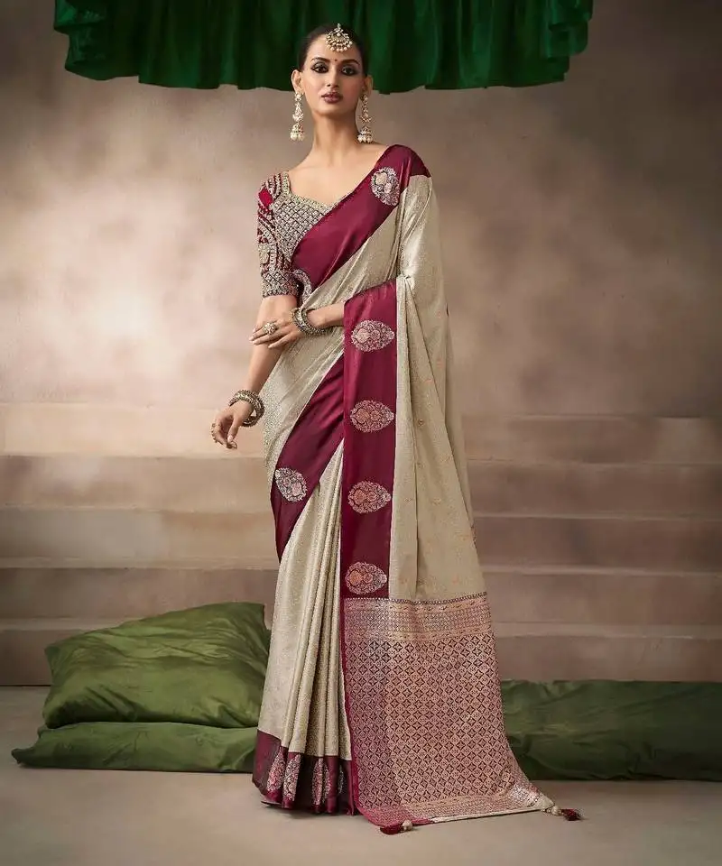 Cream satin silk blend saree with heavy embroidered silk blend blouse designer wedding saree