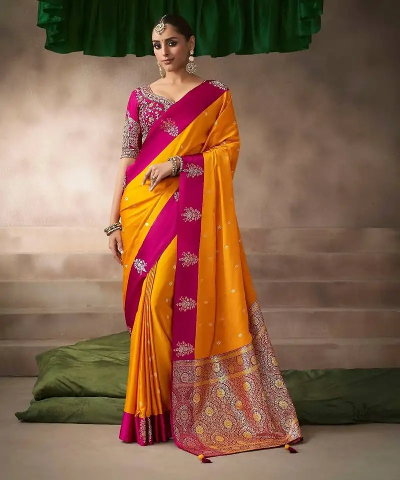 Orange satin silk blend saree with heavy embroidered silk blend blouse party & festive wear