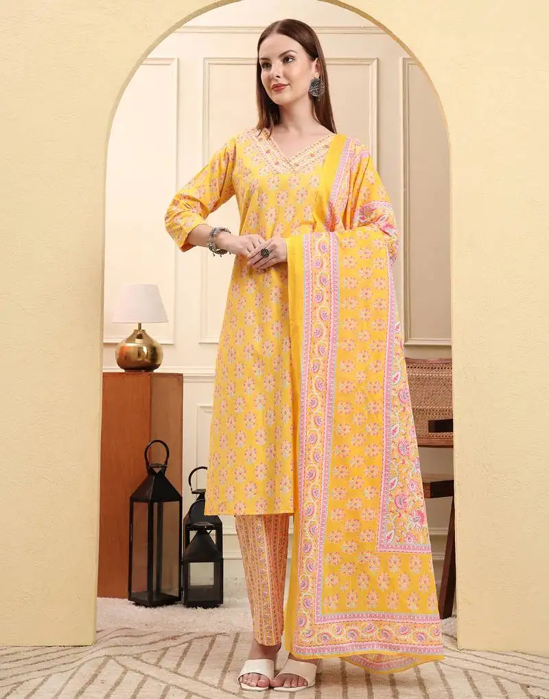 Yellow pure cotton beads and stones straight kurta trouser dupatta set