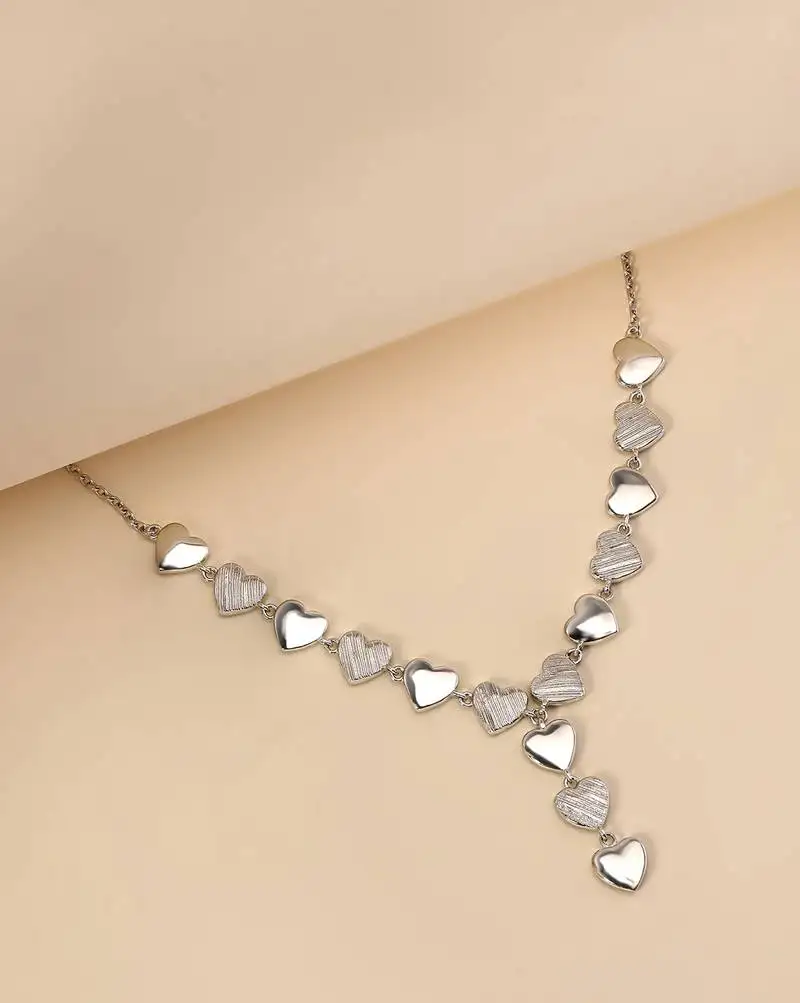 Heart cluster cz silver necklace with whimsical romance and layered charms