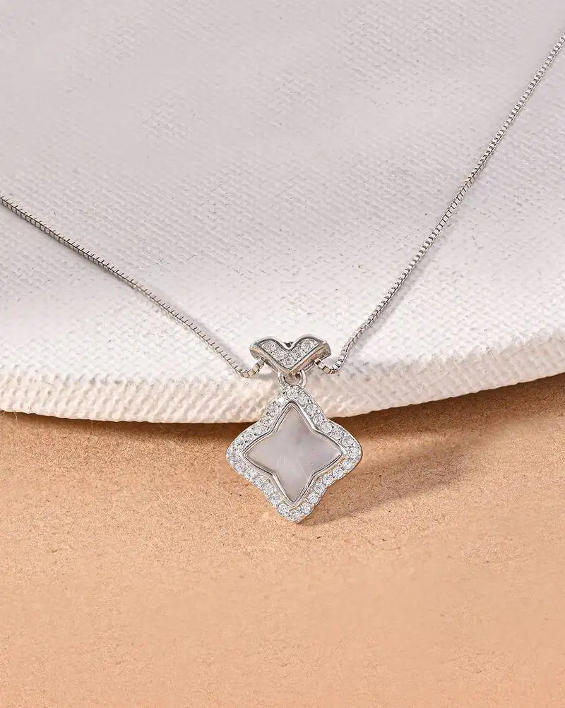 Petal-shaped cz silver necklace with four-leaf design and delicate sparkle