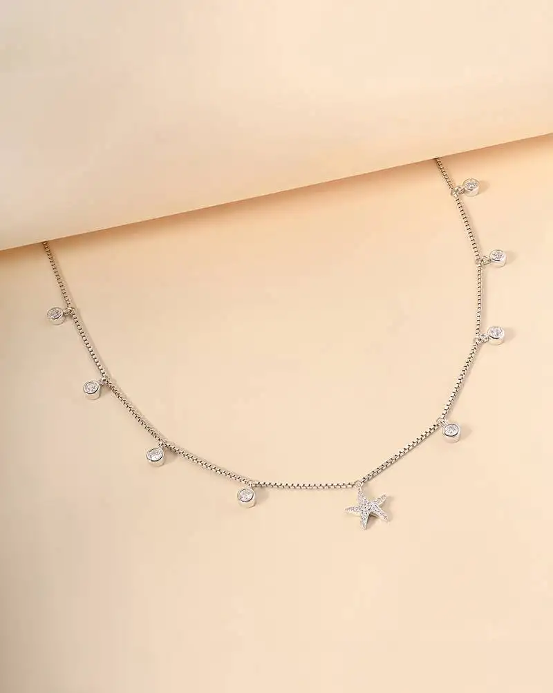 Starfish charm cz silver necklace with ocean theme and whimsical touch