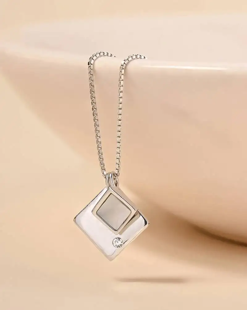 Dual pendant four-shape silver necklace with overlapping design and daily wear appeal