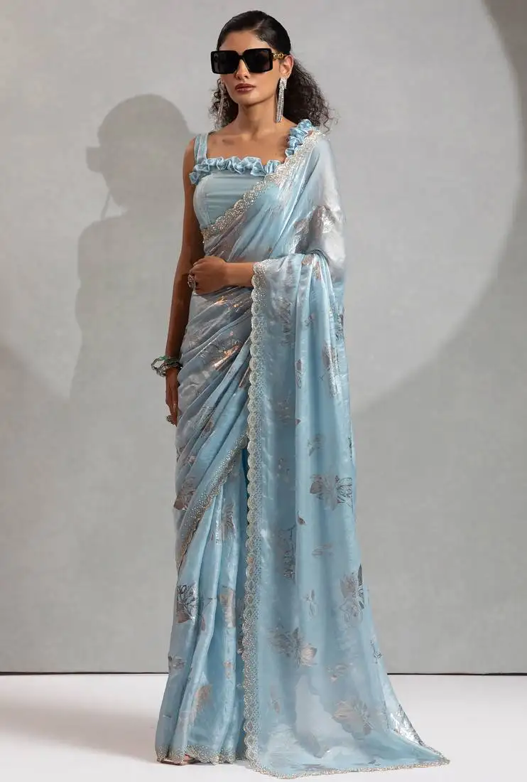 Sky blue foil printed two tone silk blend embroidered saree