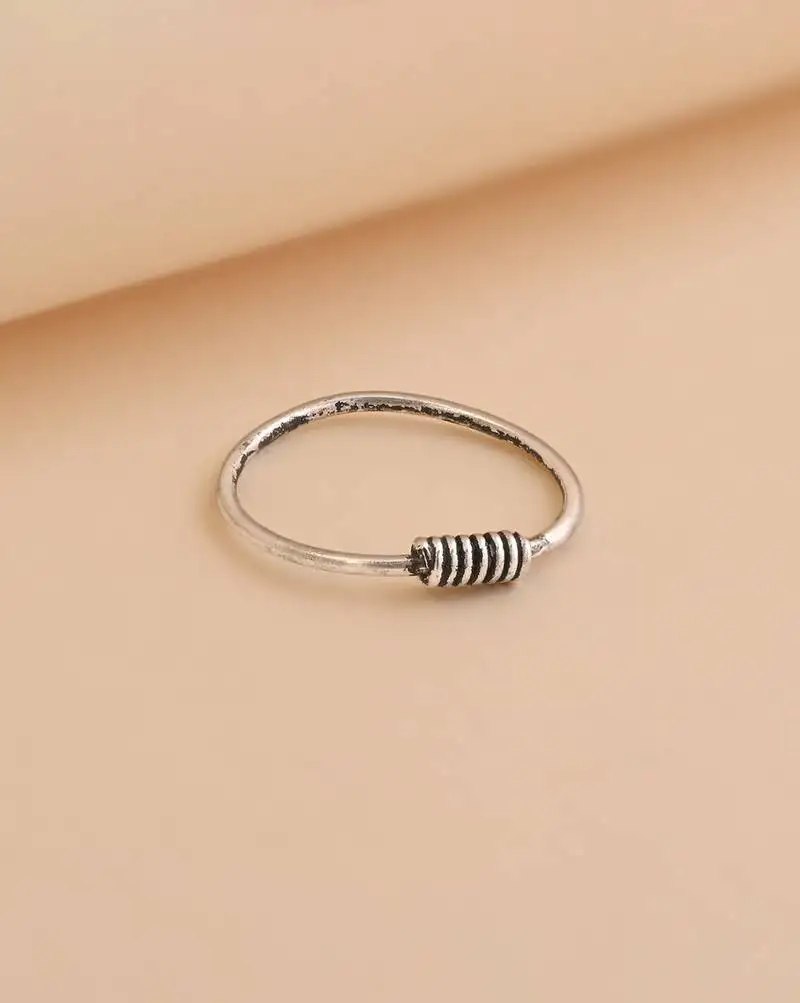 Spiral oxidized nose pin