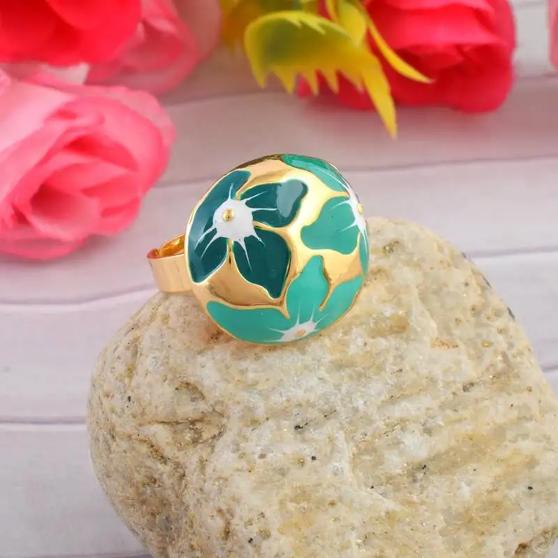 Brass gold and firoza mural finger ring for women free size