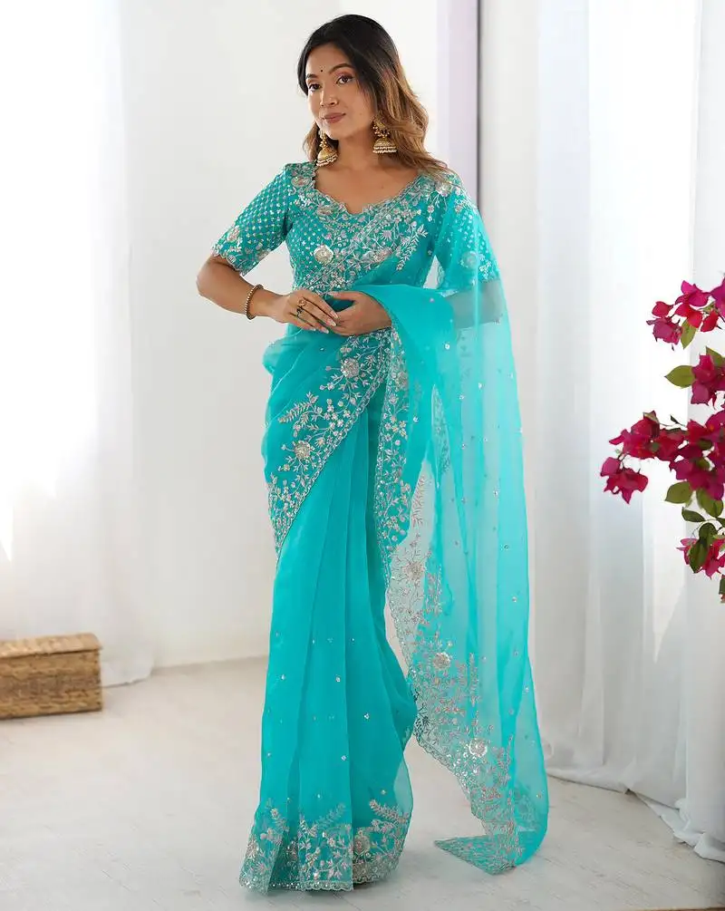 Organza turquoise blue saree with organza blouse