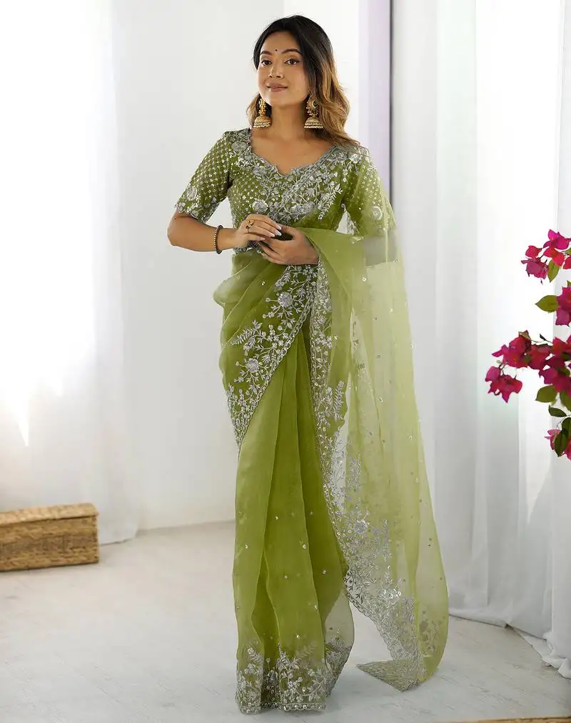 Organza green saree with organza blouse