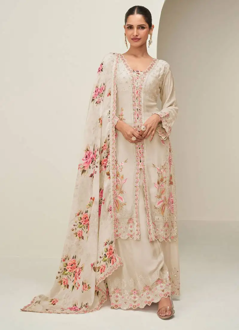 Beige chinnon silk palazzo suit with zari, sequin & mirror work and prints. free size up to 42". stitched