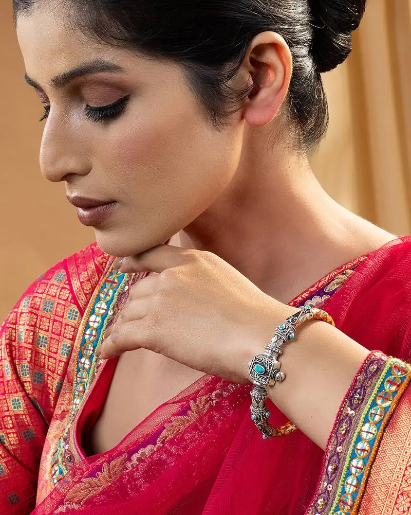Turquoise accents silver kada