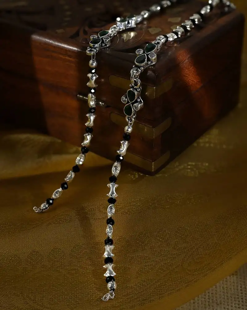 Green stone floral motif silver anklets