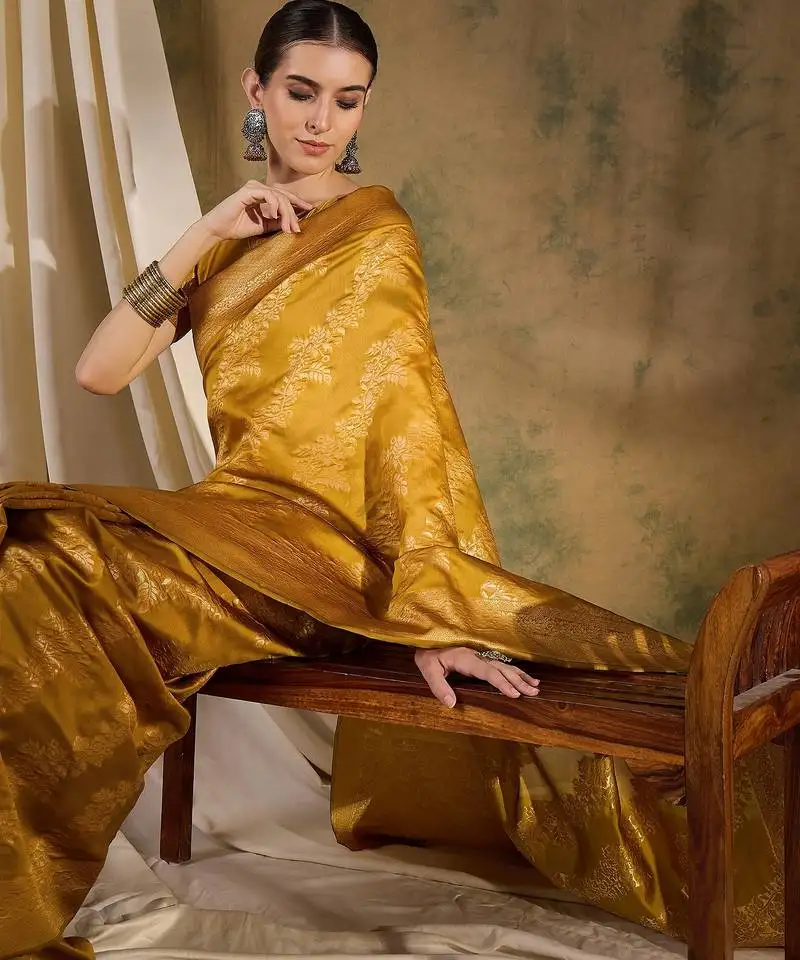 Vibrant mustard banarasi art silk saree with weaving work